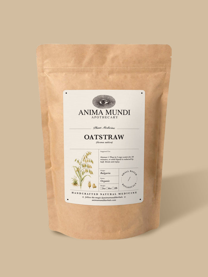 A stand-up kraft paper pouch of Anima Mundi Apothecary Oatstraw herbal supplement, shown on a solid beige background.