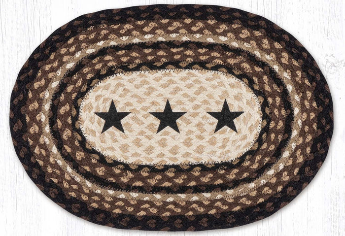 Brown, black ,and tan jute placemat with three black stars in center.