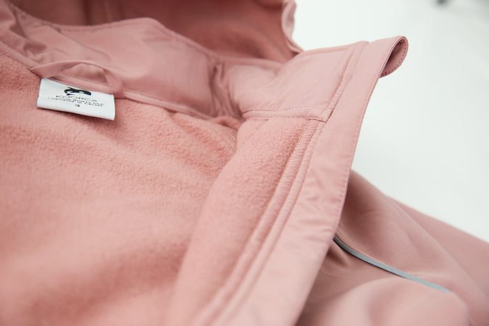 Close-up of waterproof breathable softshell fabric – ash-rose overall