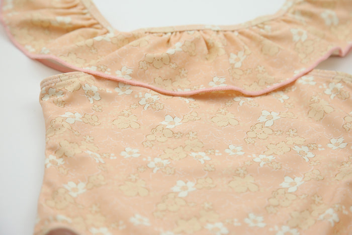 Close-up of Tuscany print quick-dry fabric – Evangelina ruffle swimsuit