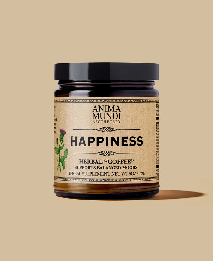 A jar of 'HAPPINESS Powder | Herbal "Coffee"' by Anima Mundi Apothecary, with a label featuring botanical illustrations and information about the product.