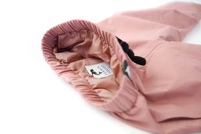 Elastic waistband detail – ash-rose hard-shell rain pants