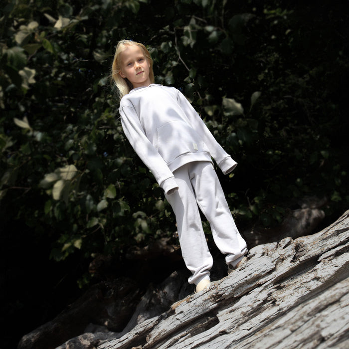 Kid playing in dove grey brushed terry hoodie by KidORCA