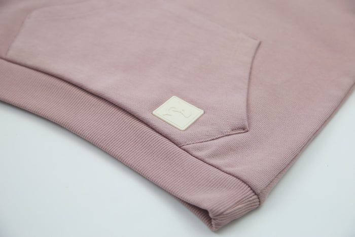 Kangaroo pocket and rib cuff detail on mauve french terry kids hoodie
