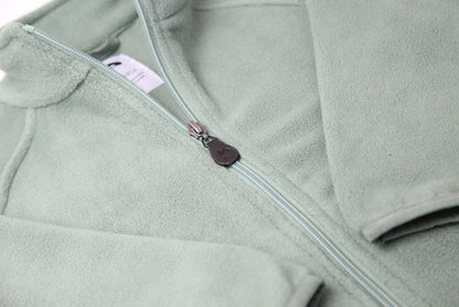 Close-up of soft fleece fabric – olive kids jacket