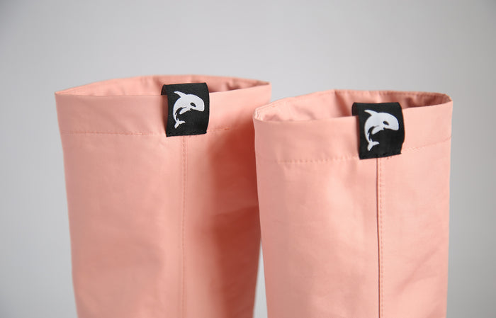 Easy pull-on handles detail on coral rain boots waders