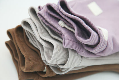 Rib cuff and side pocket detail on wheat brushed terry kids sweatpants