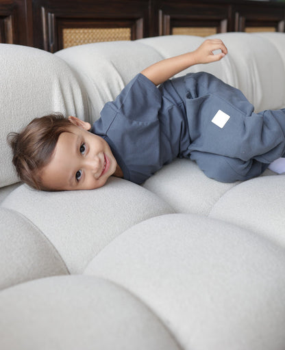 Kid playing in fjord blue french terry sweatpants by KidORCA