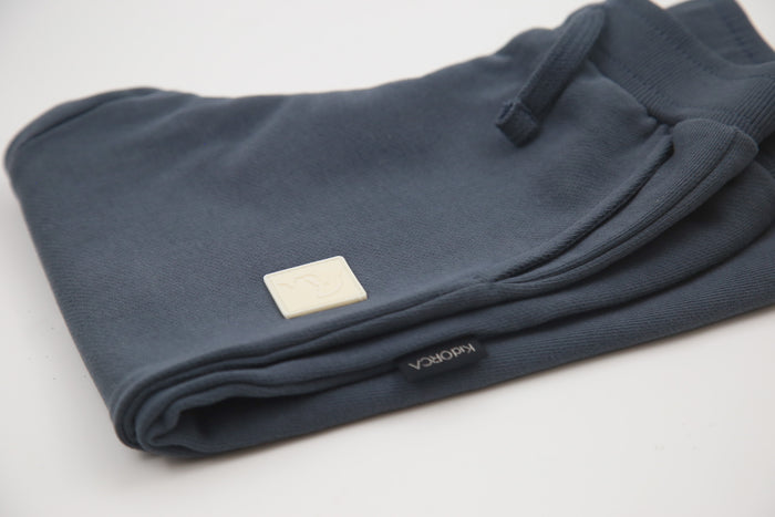 Rib cuff and side pocket detail on fjord blue french terry kids sweatpants
