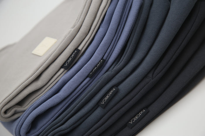 Close-up of organic french terry fabric texture – fjord blue kids sweatpants