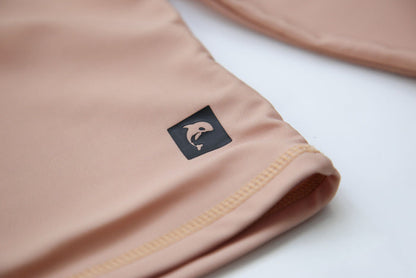 Close-up of quick-dry Tuscany-print fabric texture – long sleeve rashguard