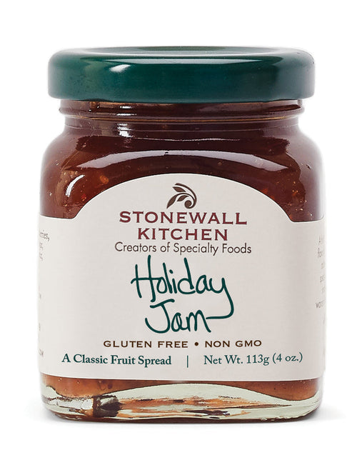 A jar of Stonewall Kitchen Holiday Jam with a label indicating it is gluten free and non-GMO. The jam is presented as a classic fruit spread.