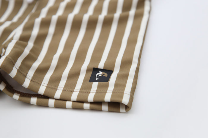 Close-up of quick-dry recycled nylon fabric – stripe khaki boardie shorts