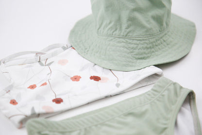 Close-up of quick-dry sage green fabric – girls swim bottom